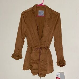 Bagatelle throw over coat